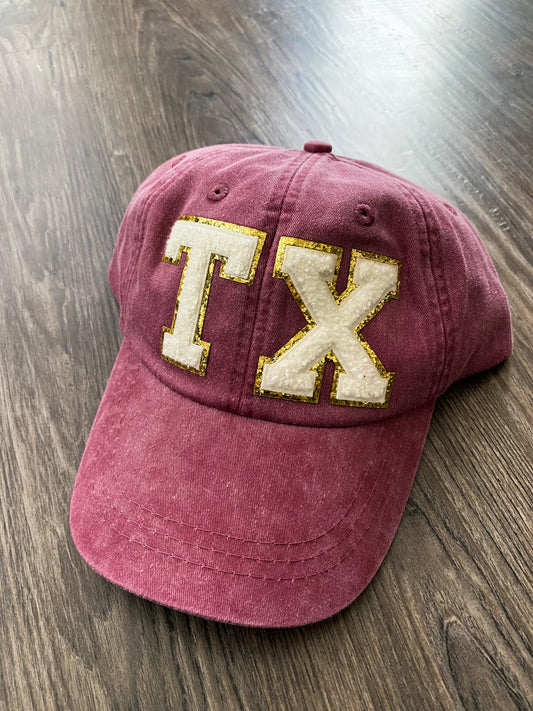 TX maroon baseball cap